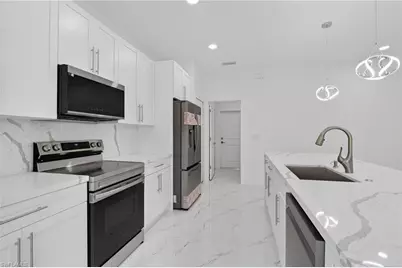 1103 E 7th St, Lehigh Acres, FL 33972 - Photo 4