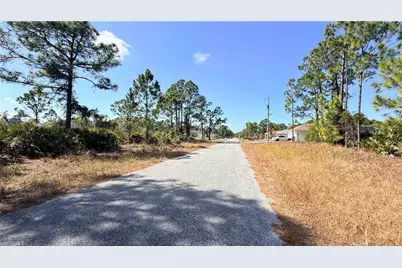 1076 Bells St E, Lehigh Acres, FL 33974 - Photo 2