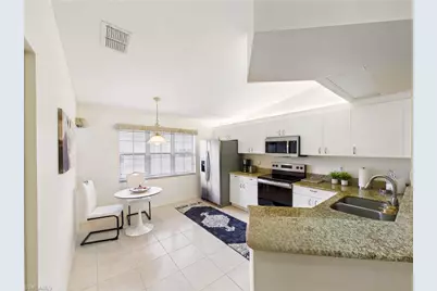 7435 Plumbago Bridge Rd #K201, Naples, FL 34109 - Photo 4