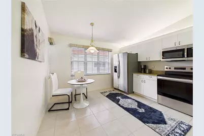 7435 Plumbago Bridge Rd #K201, Naples, FL 34109 - Photo 8