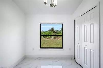 3018 11th St SW, Lehigh Acres, FL 33971 - Photo 6