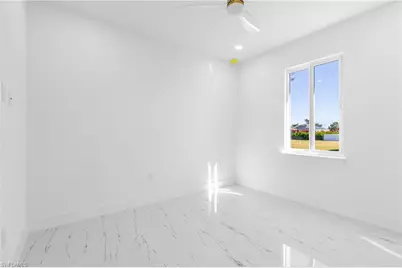 2716 25th St SW, Lehigh Acres, FL 33976 - Photo 34