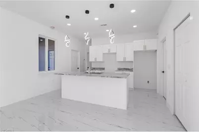 2716 25th St SW, Lehigh Acres, FL 33976 - Photo 40