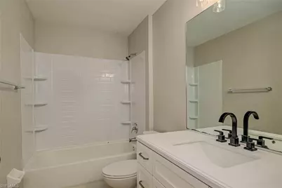 704 Ichabod Ave, Lehigh Acres, FL 33973 - Photo 14