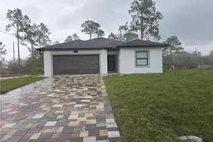 12 W 15th St, Lehigh Acres, FL 33972 - Photo 1