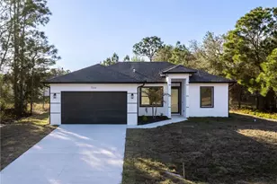 566 Eisenhower Blvd, Lehigh Acres, FL 33974 - Photo 1