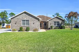 908 Pine Ave, Lehigh Acres, FL 33972 - Photo 1