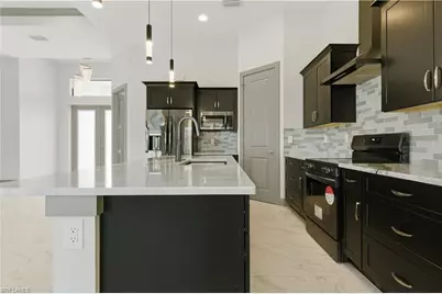 1706 NW 36th Pl, Cape Coral, FL 33993 - Photo 4