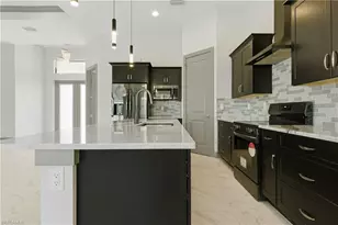 1706 NW 36th Pl, Cape Coral, FL 33993 - Photo 4