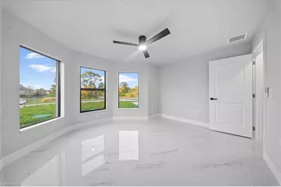 2715 27th St SW, Lehigh Acres, FL 33976 - Photo 14