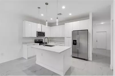 1037 Citrus Ave S, Lehigh Acres, FL 33974 - Photo 4