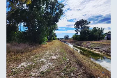 3125 29th St SW, Lehigh Acres, FL 33976 - Photo 1