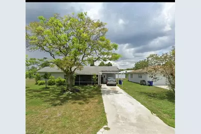 121 E 3rd St, Lehigh Acres, FL 33936 - Photo 1