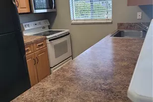 1014 Country Club Blvd, Cape Coral, FL 33990 - Photo 2