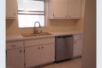 242 S Lake Dr, Lehigh Acres, FL 33936 - Photo 6