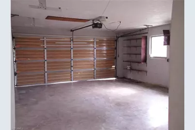 242 S Lake Dr, Lehigh Acres, FL 33936 - Photo 14