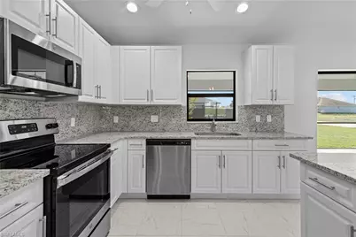 710 NW 2nd Ln, Cape Coral, FL 33993 - Photo 4