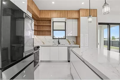 1030 NE Juanita Pl, Cape Coral, FL 33909 - Photo 10