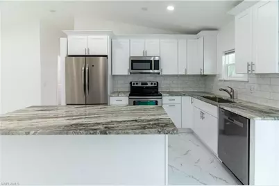 3317 17th St SW, Lehigh Acres, FL 33976 - Photo 12
