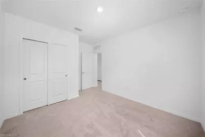 258 Silent Lake Dr, Lehigh Acres, FL 33936 - Photo 18