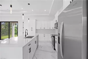 719 Fullerton Ave S, Lehigh Acres, FL 33974 - Photo 14