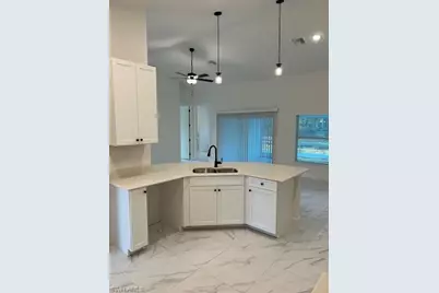 660 Ames St E, Lehigh Acres, FL 33974 - Photo 4