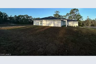 660 Ames St E, Lehigh Acres, FL 33974 - Photo 2