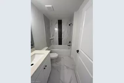 660 Ames St E, Lehigh Acres, FL 33974 - Photo 14