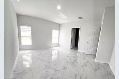 825 Porter St E, Lehigh Acres, FL 33974 - Photo 14