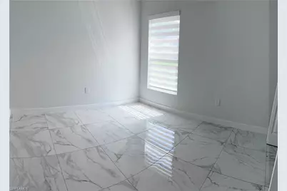 825 Porter St E, Lehigh Acres, FL 33974 - Photo 12