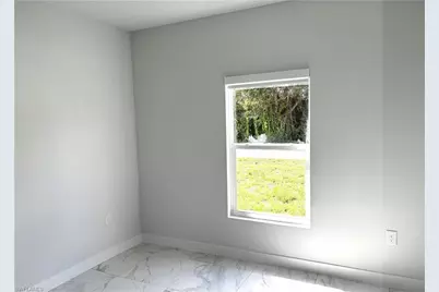 825 Porter St E, Lehigh Acres, FL 33974 - Photo 20