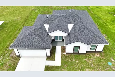 825 Porter St E, Lehigh Acres, FL 33974 - Photo 4