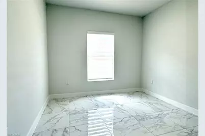 825 Porter St E, Lehigh Acres, FL 33974 - Photo 10