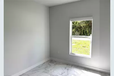 825 Porter St E, Lehigh Acres, FL 33974 - Photo 24