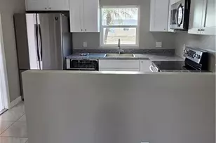 1117 Gordon Ave S, Lehigh Acres, FL 33973 - Photo 4