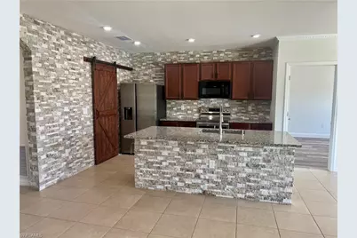 10293 Silver Pond Ln, Lehigh Acres, FL 33936 - Photo 16