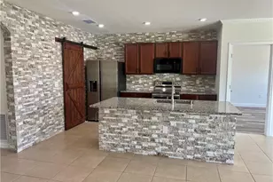 10293 Silver Pond Lane, Lehigh Acres, FL 33936 - Photo 16