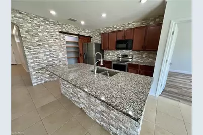 10293 Silver Pond Ln, Lehigh Acres, FL 33936 - Photo 14