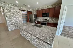 10293 Silver Pond Lane, Lehigh Acres, FL 33936 - Photo 14