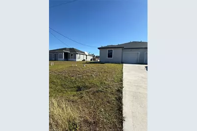 1135 Harvest Ave #A, Lehigh Acres, FL 33974 - Photo 1