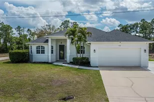 1256 Edna St E, Lehigh Acres, FL 33974 - Photo 2