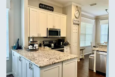 1061 Egrets Walk Cir #201, Naples, FL 34108 - Photo 6