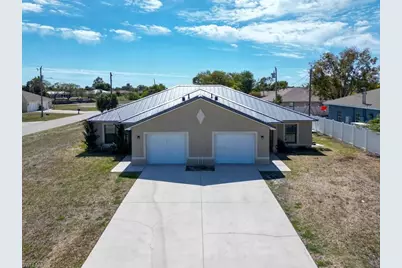 1054 SE 10th St, Cape Coral, FL 33990 - Photo 1