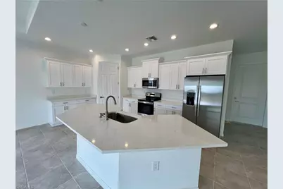 630 Falls Ln, Lehigh Acres, FL 33974 - Photo 14