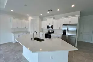 630 Falls Ln, Lehigh Acres, FL 33974 - Photo 14