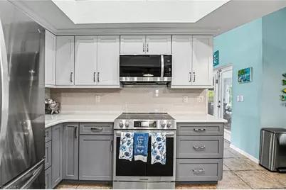 107 NW 13th Ter, Cape Coral, FL 33993 - Photo 4