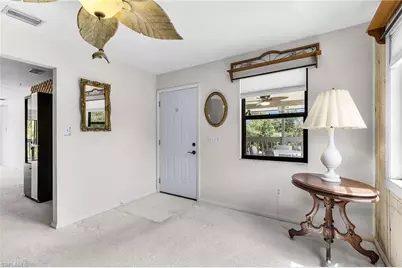 8677 Whispering Pines Dr, Saint James City, FL 33956 - Photo 12