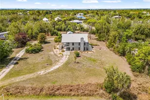8677 Whispering Pines Dr, Saint James City, FL 33956 - Photo 1