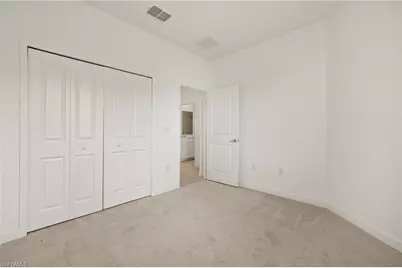 9077 Leatherwood Loop, Lehigh Acres, FL 33936 - Photo 22