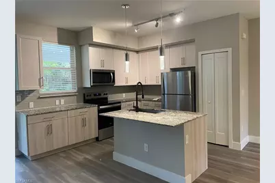7040 Ambrosia Ln #305, Naples, FL 34119 - Photo 2